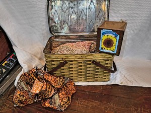 Animal print scarf, woven throw blanket, picnic basket, sunflower box