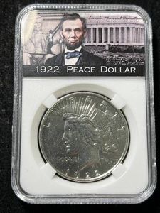1922-D US PEACE SILVER DOLLAR SLABBED