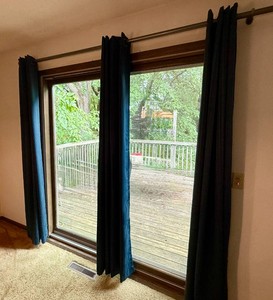 Seven Blue Grommet Curtain Panels