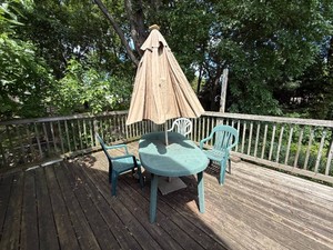 Patio Table with Three Chairs and Umbrella