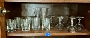Group of etched glass sherberts and flutes