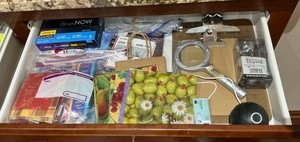 Drawer full of misc items Bottle Stopper, Napkins office&nbsp