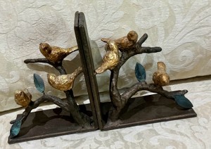 Cast Metal gold and black book ends, figural birds