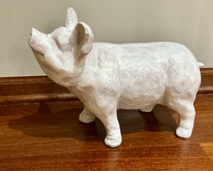 Decorative pig sculpture possibly resin or ceramic with a distressed white finish