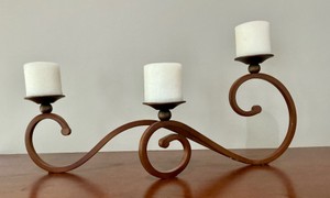 3 tiered composition iron candle holder