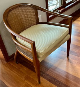 American of martinsville cane barrel back chair, curved wooden frame, yellow-striped cushion
