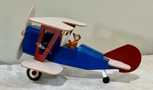 Vintage wind-up wood plane, Berkeley designs music box, fly me to the moon