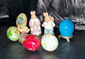 Group of paper mache, stone easter eggs and resin figurines