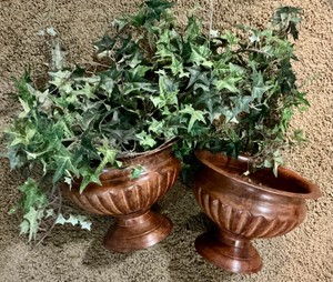 Group of decor arrangements, metal flower pots