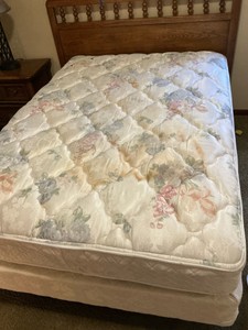 Full sized Wood Jenny Lind Style headboard with metal frame, mattress and box spring