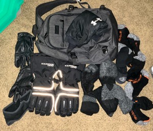 Group of wool socks, gloves and backpack