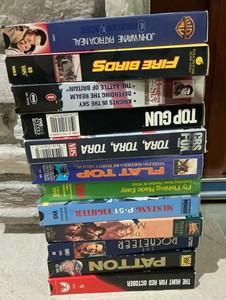 Various VHS tapes, Top gun, Patton, Firebirds, aviation