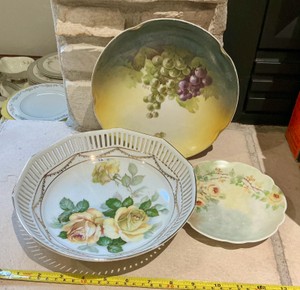 Antique hand-painted porcelain plates and bowl