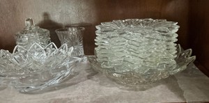 Entire shelf of group of early American pressed glass, candy bowls and dishes