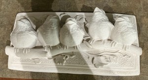 Plaster bird plaque