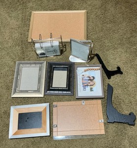 Group of Silver Colored Desk and Wall picture frames 2 stands