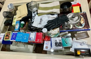 Drawer of playing cards, golf balls and misc items