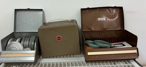 Vintage Kodak Browning 8mm Movie Projector and Movies on Reels in tin can containers