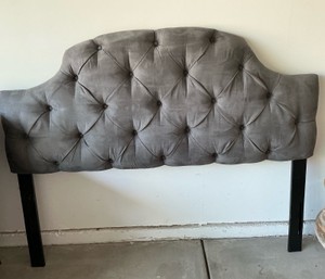 Velvet headboard with deep button tufting