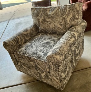 Capernicus swivel glider chair with greywhite paisley fabric pattern