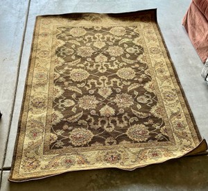 Might be hand knotted Ziegler or Peshawar-style area rug, floral design
