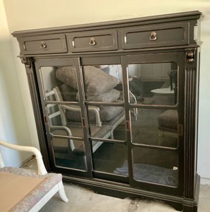 Black rubbed -finish, sliding door bookcase