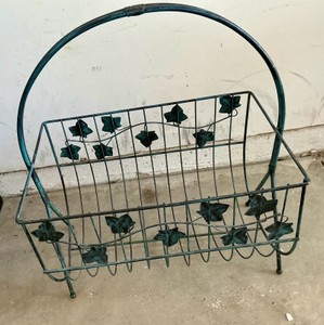 Green metal magazine rack