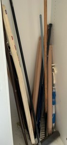 misc. items, garden rakes, chair umbrellas, ironing board