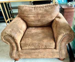 Rustic style leather chair, nailhead trim, rolled arms