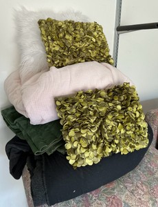 Various blankets and pillows