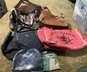 Group of various purses, bags, Coach, Guess, Michael Kors