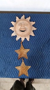 terre cotta sun with tin stars