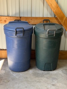2 - Plastic Rubbermaid Garbage Cans with wheels