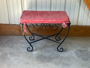 vintage Spanish Revival style wrought iron bench with cushioned seat