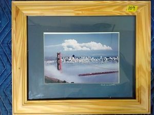 Ed B Roundtable San Francisco Bridge print in natural wood frame.