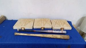 3 softball base mats, Louisville softball bat and H&B wood bat