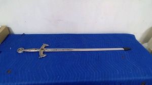 Crossguard sword with gold accents