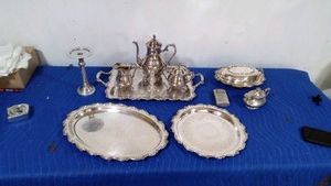 Silver plater tea set, casserole dish, platters,graver boat, candle stick and 1960 handwarmer