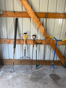 pitch forks, hoe, weed pullers and fire pit log puller