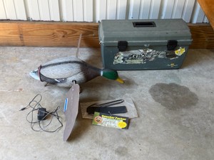 motorized spinning wing duck decoy, a piece of waterfowling gear used by hunters to attract waterfowl by mimicking the flashes of a ducks wings.