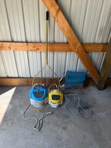 2 - minnow buckets, fishing net, cushion and 2 - minnow traps