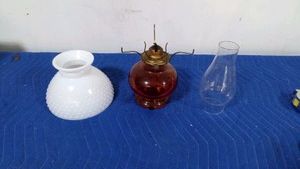 Vintage Hurricane lamp with a ruby red base with a hobnail milk glass shade