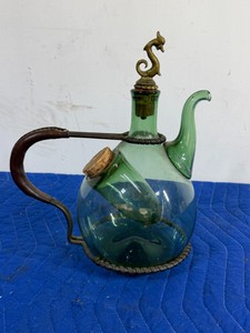 vintage Italian hand-blown green glass wine decanter designed with a built-in internal ice chamber