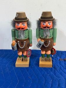 pair of vintage German Hofbruhaus (HB) Bavarian Oktoberfest nutcrackers. Handcrafted in Germanys famous Erzgebirge region