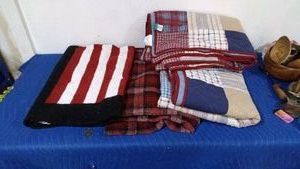 2 quilts and 2 throw blankets