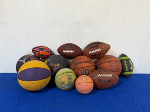 Lot of Footballs and Basketballs