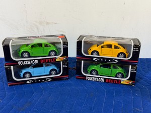 4 - Die Cast Volkswagen Beetle Cars in Original Boxes - 132 scale