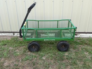Gorilla Carts branded steel garden cart featuring a green mesh bed and 10-inch pneumatic tires.