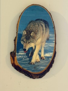 Wolf picture on a piece of wood
