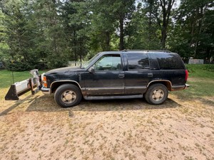 1999 4 Door 4x4 Chevy Tahoe with Plow - see description for more info - Keep in mind vehicle will have to be picked up Monday thru Thursday from 10am to 4pm following auction close. Plz call 218 838 8751 to set up time